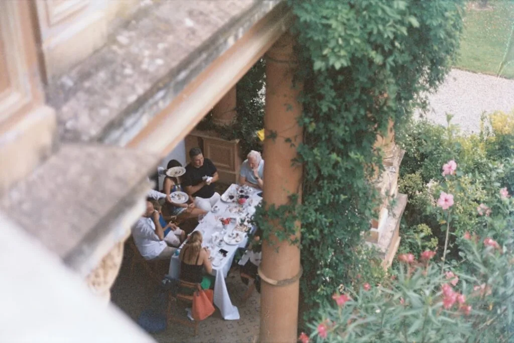 Cascina Cuccagna courtyard lunch family