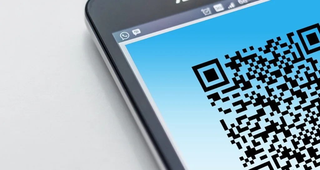 QR code affiché sur écran de smartphone pour billet Milan